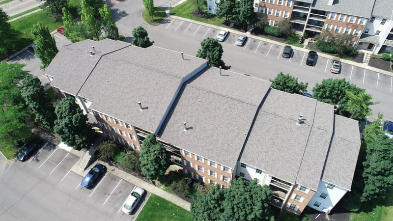 Aerial view of shingle roof on apartment building